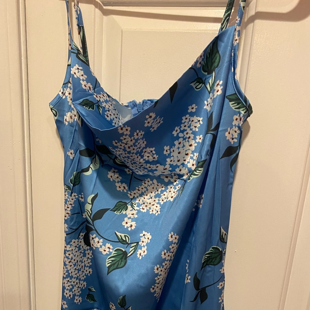 Brand new Flower dress. Light blue size XS